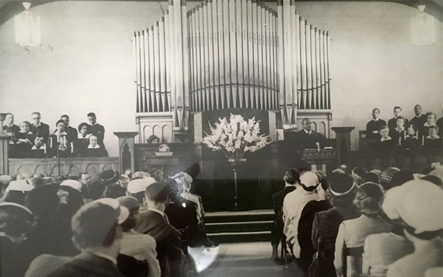 The Church for the Fellowship of All Peoples, Dr. Howard Thurman in pulpit during service, circa 1950. Source: The Church for the Fellowship of All Peoples